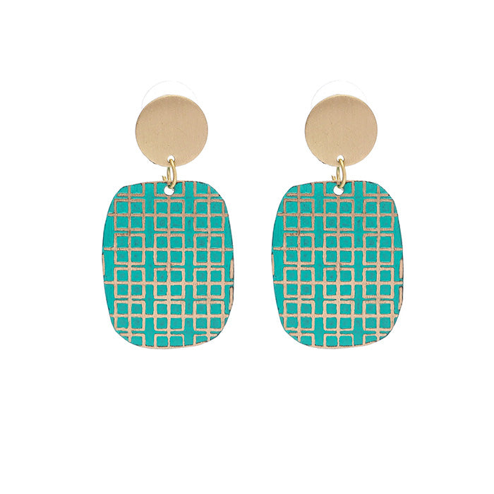Earrings in two circular pieces, the top gold and the bottom patterned green. Photographed in front of a white background.