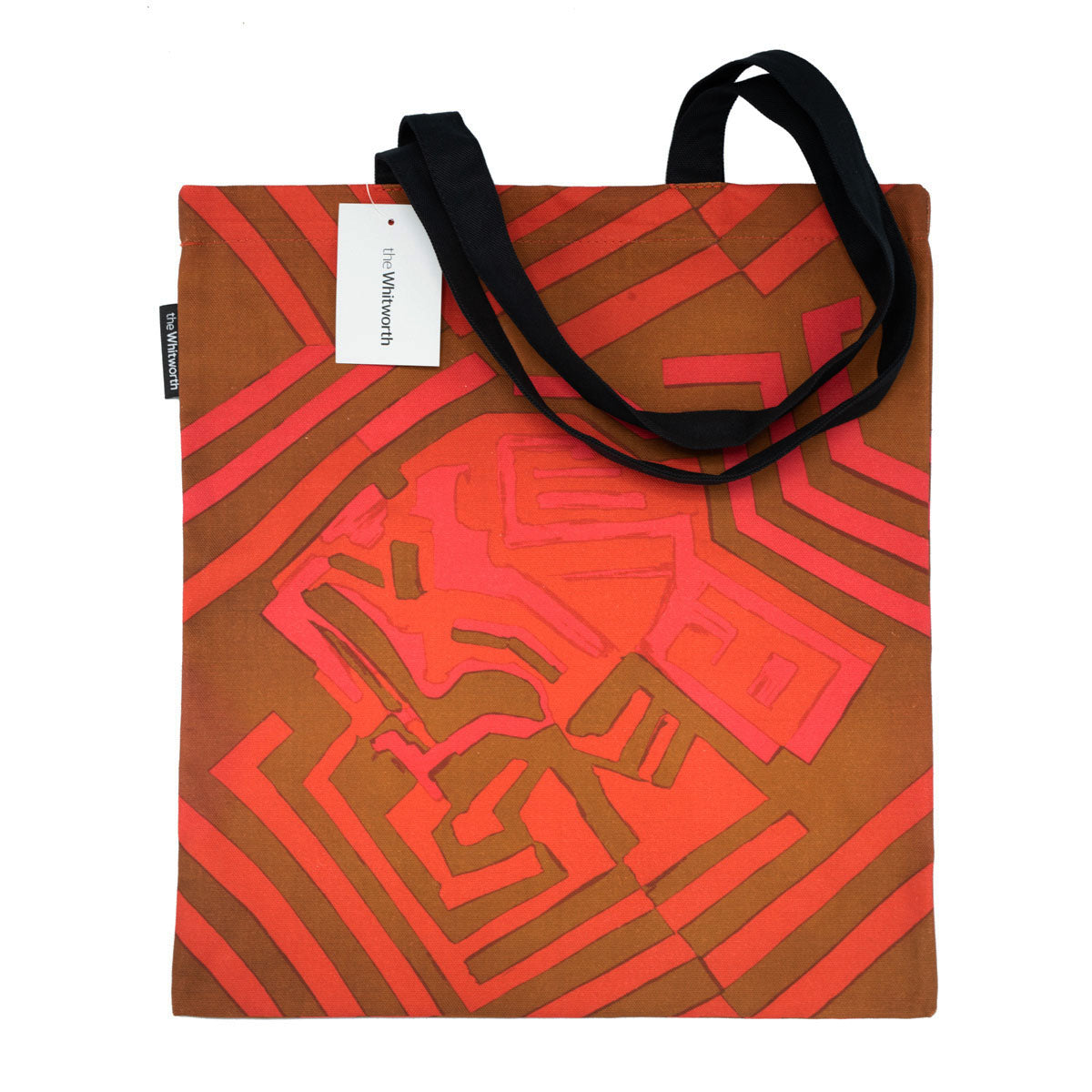 Red tote bag with a black handle featuring a red and pink design by Shirley Craven.