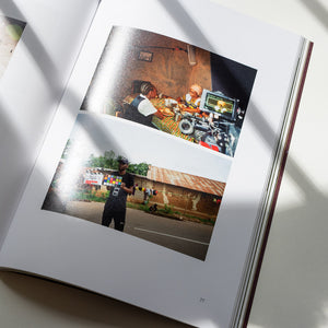 Photograph of a book laid out, showing two images