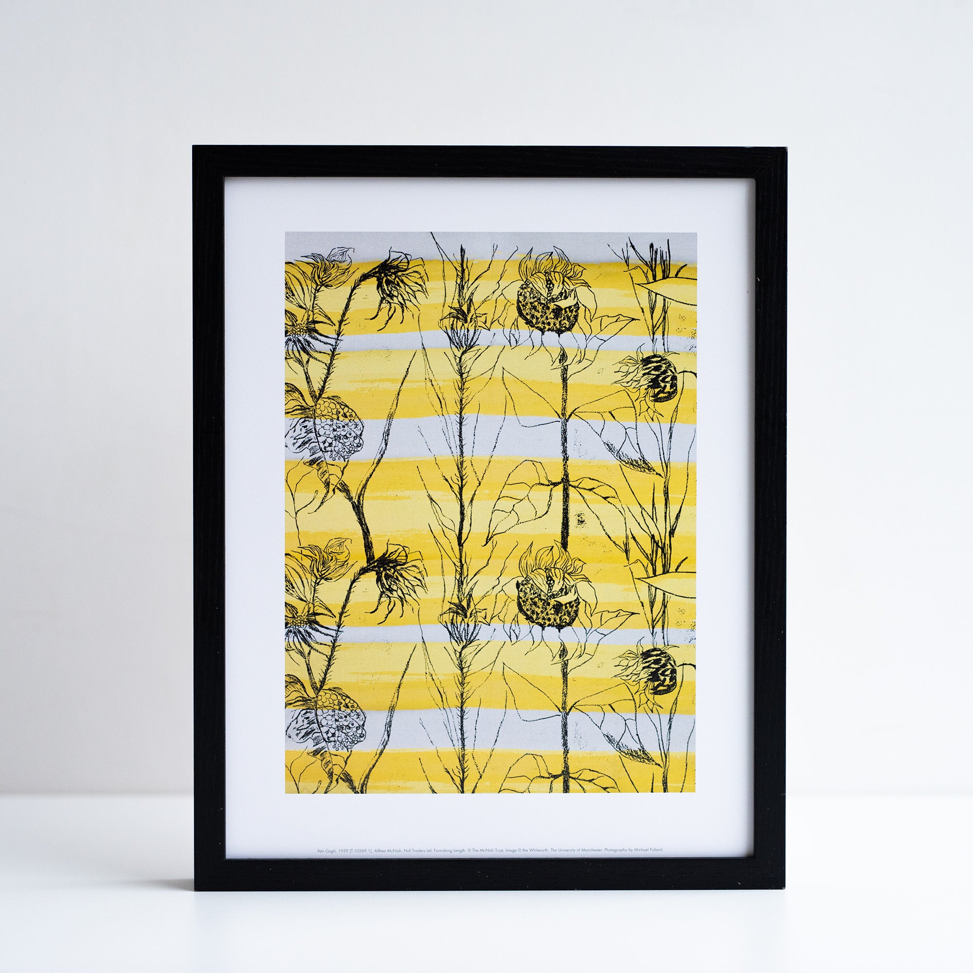 Framed reproduction of Van Gogh textile design by Althea McNish. Yellow, white and black floral design