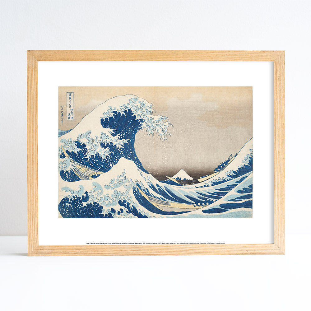 Framed artwork of a wave with Mount Fuji, similar to 'The Great Wave off Kanagawa'.