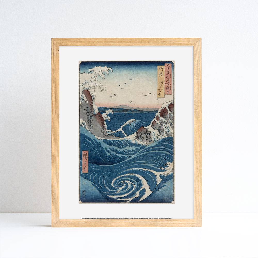 Framed print of Japanese woodblock print artwork by Hiroshige of a wave and whilrpool