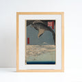 Artwork of a traditional Japanese print with an eagle and mountain landscape. Placed in an ash frame against a white background.