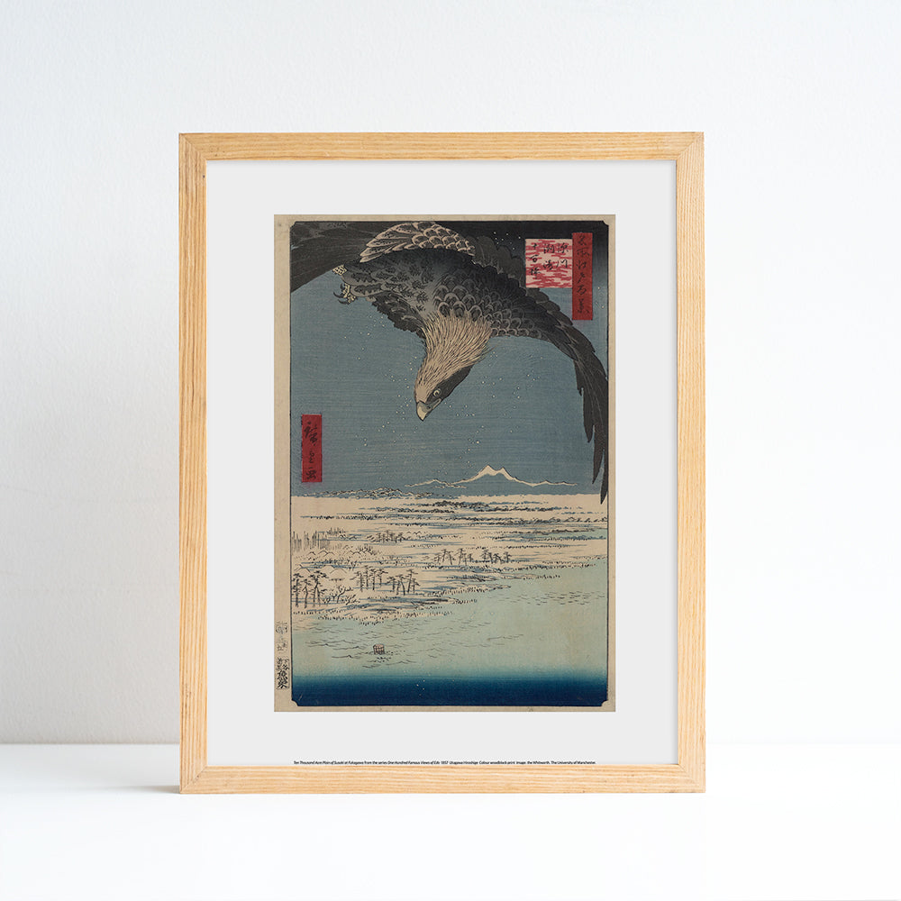Artwork of a traditional Japanese print with an eagle and mountain landscape. Placed in an ash frame against a white background.