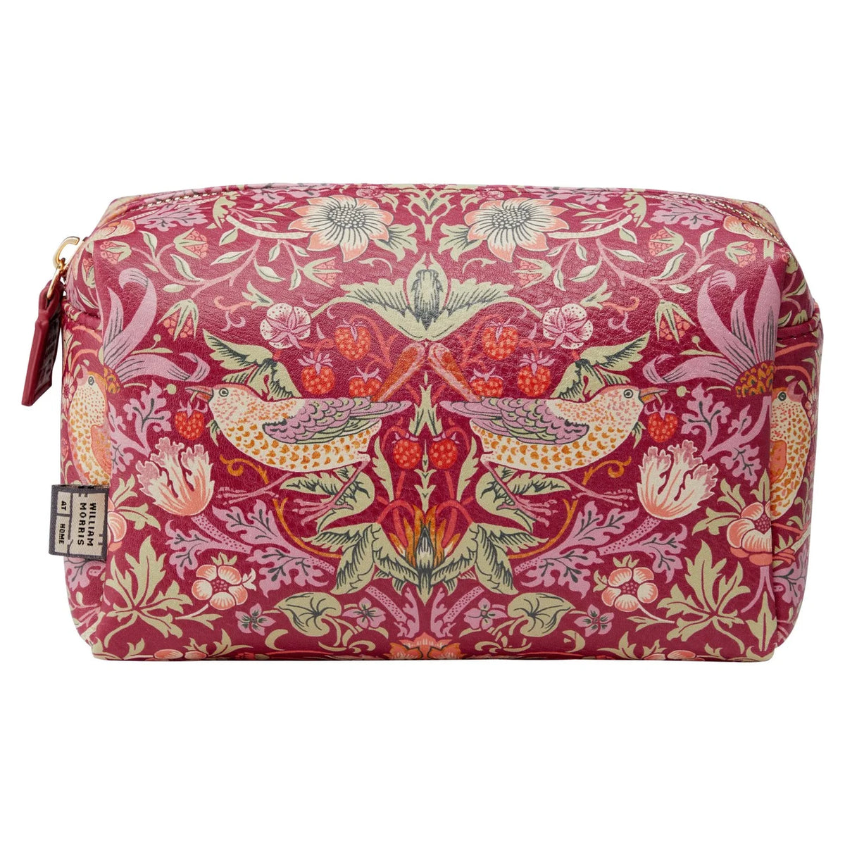 A rectangular cosmetic pouch with a red background and a detailed floral and bird pattern in pink, green, and yellow, featuring a gold zipper and a small hanging brand tag.