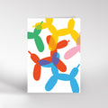 Birthday card with a colourful balloon animal illustration on a white background