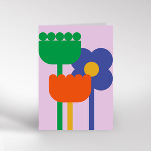 Greeting card with colourful floral design on a light purple background