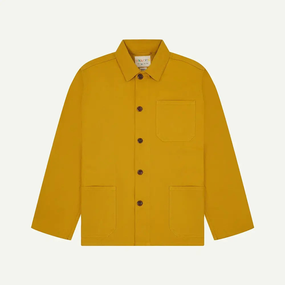 Yellow jacket with button details on a white background