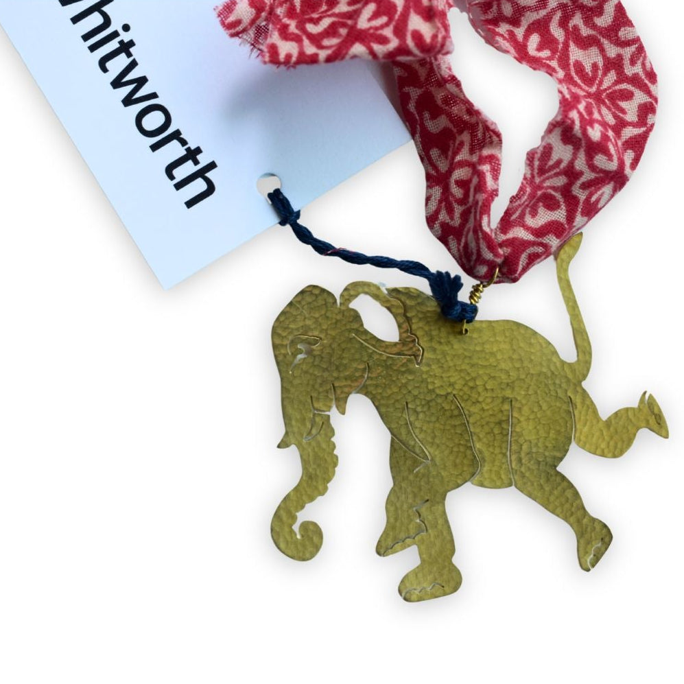 Close up of brass elephant decoration.