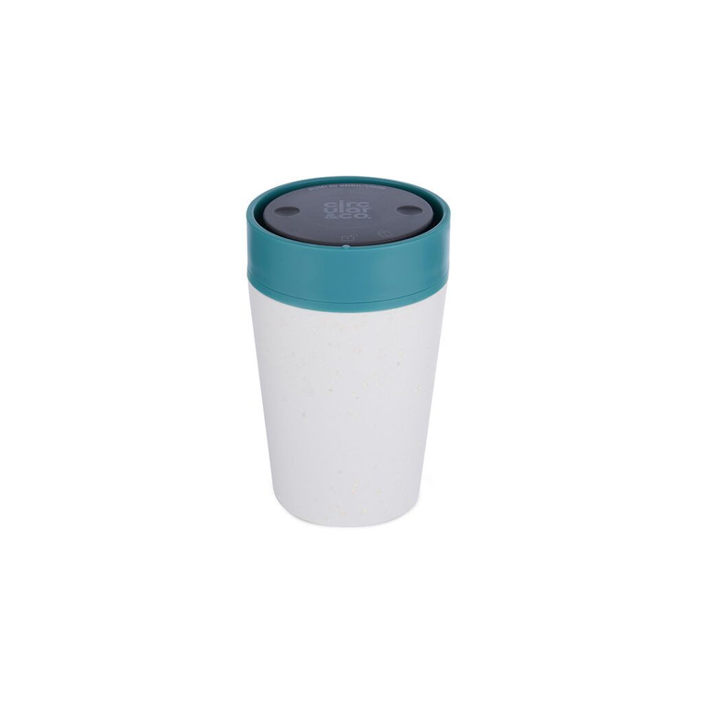 A white reusable coffee cup with a teal lid and a small circular logo on top.