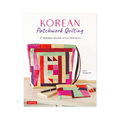 Book cover featuring a bag made out of patchwork quilt at the centre
