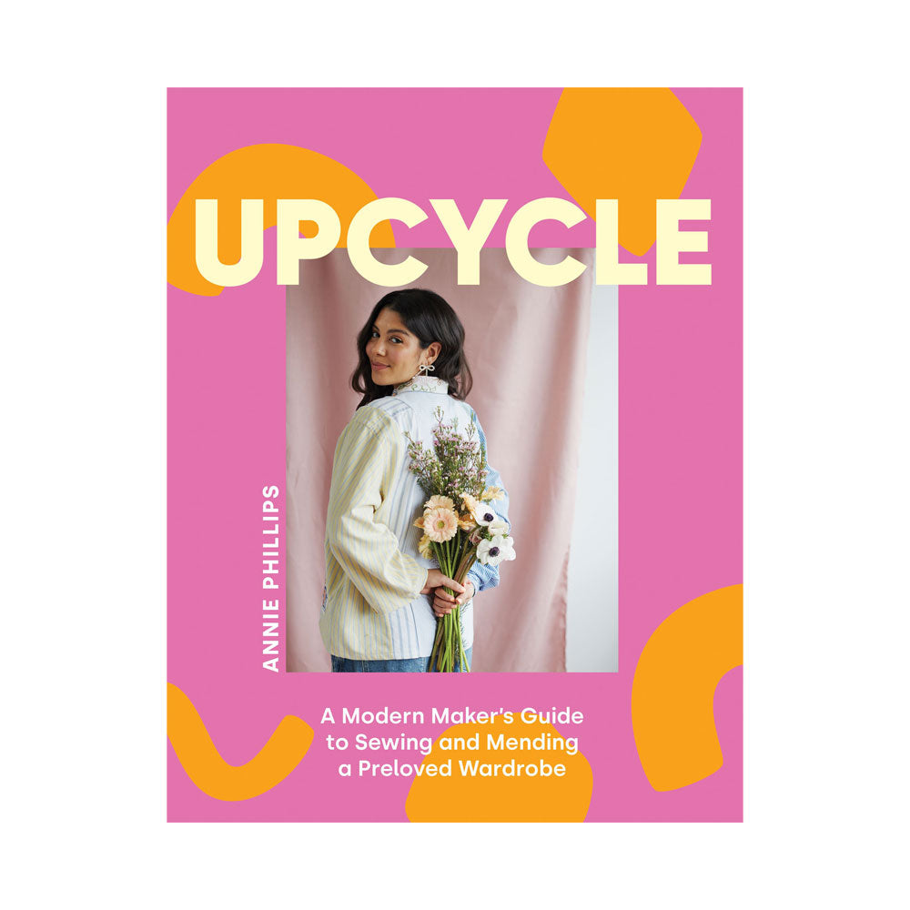 Pink book cover with photograph of the author