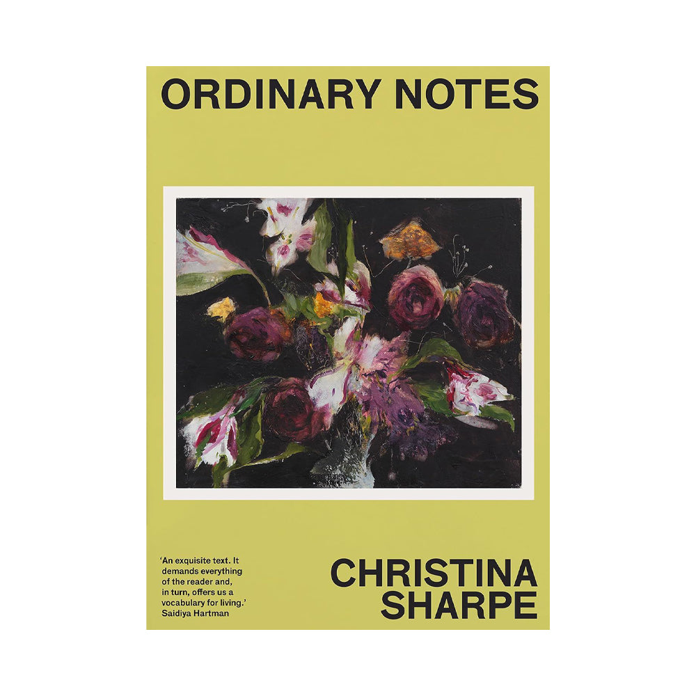 Yellow book cover with painting of flowers