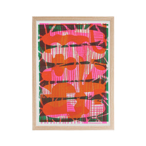 A risograph print featuring red, green and orange abstract shapes stacked on top of each other. Presented in a brown frame.