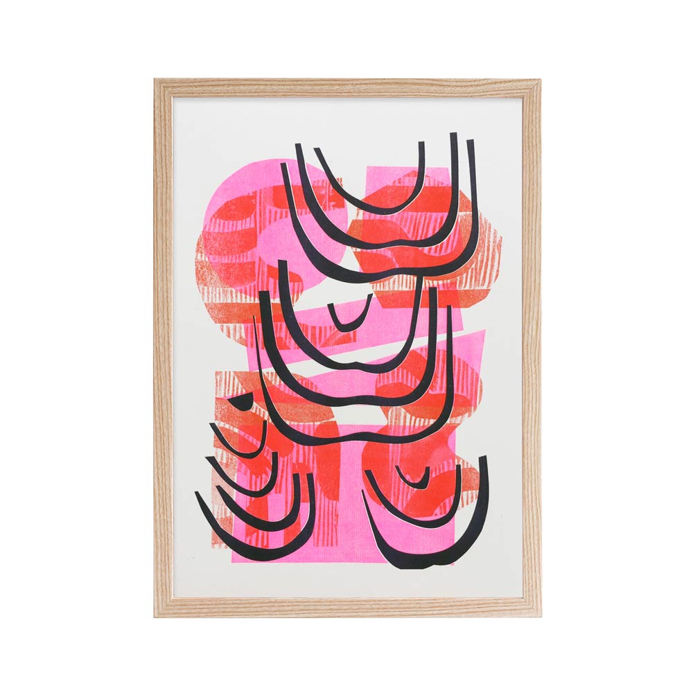 Risograph print featuring a pink and red abstract graphic illustration.  Presented in a brown frame.