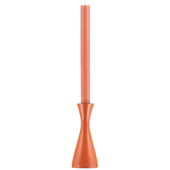 Copper-colored candle holder with a candle on a white background