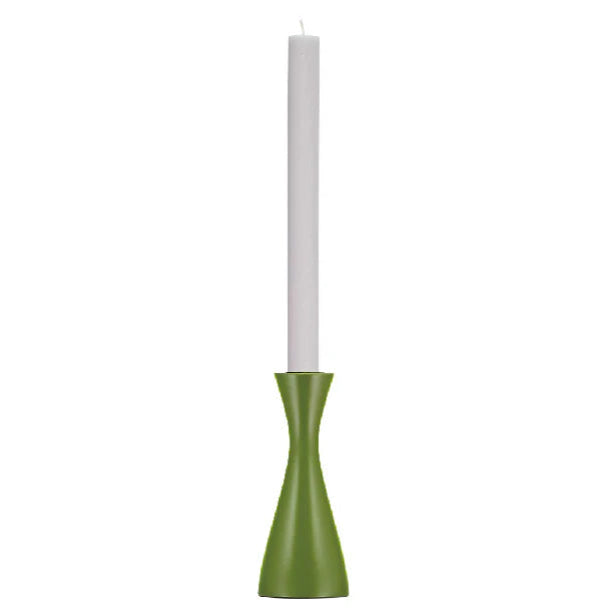 Green candle holder with a white candle on a white background