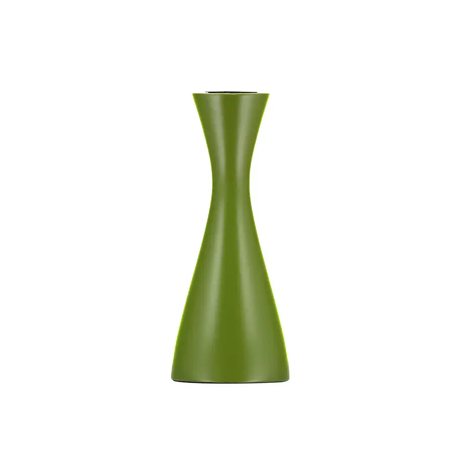 Cylindrical green candle holder on a white background