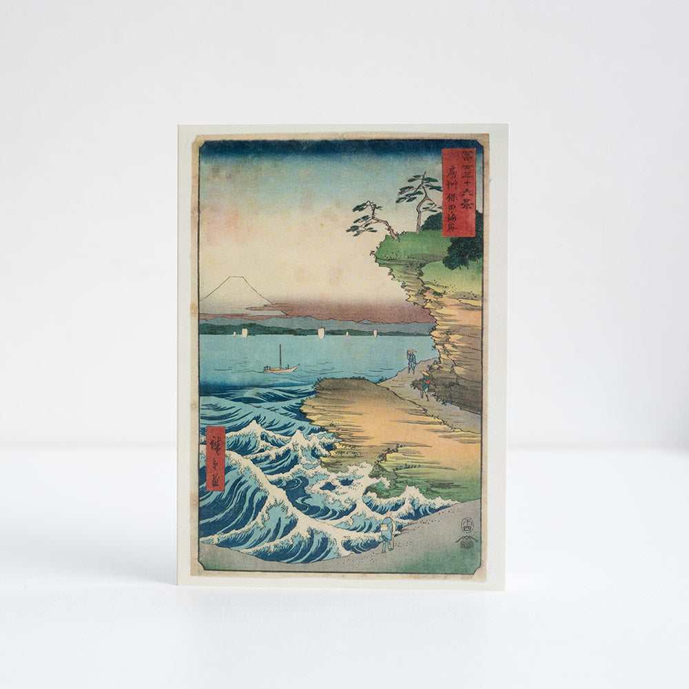 Greetings card of a traditional Japanese landscape with waves and mountain.