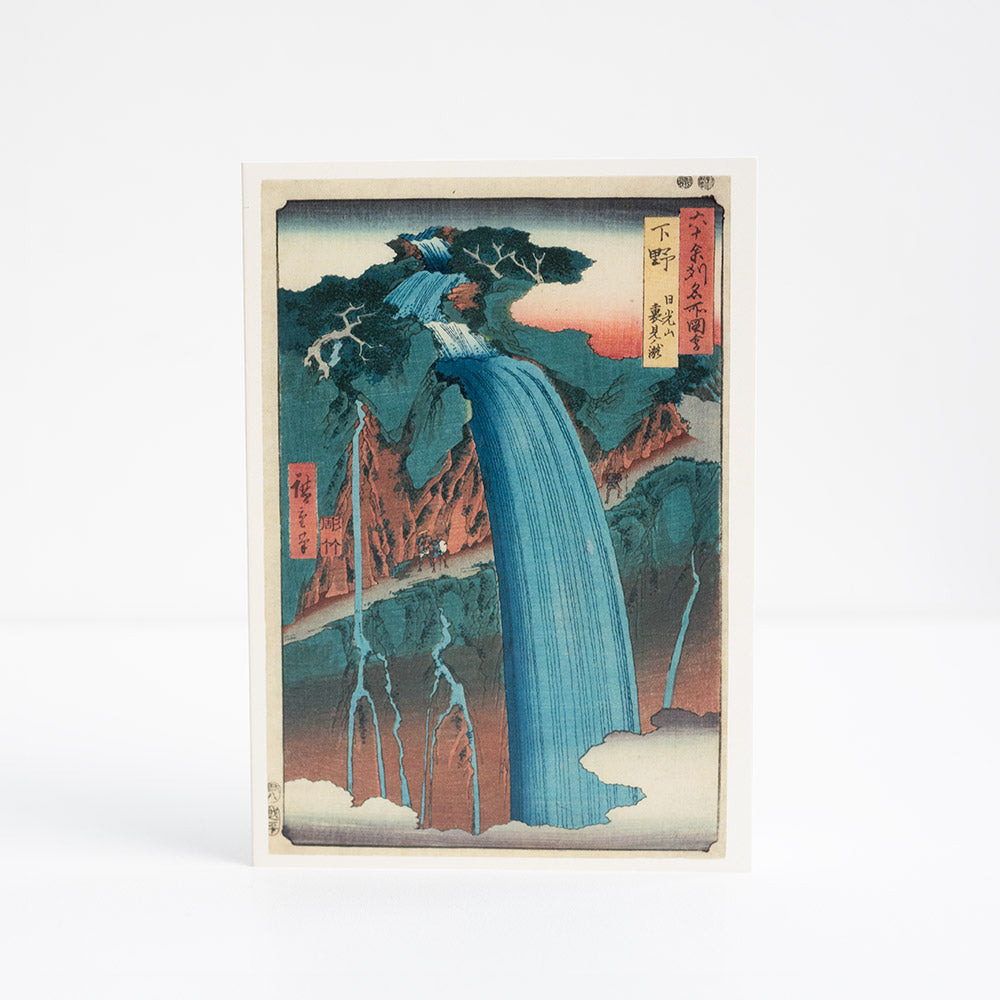 Greetings card of a traditional Japanese woodblock design of a waterfall.