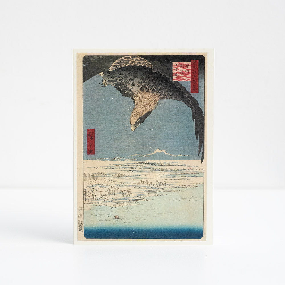 Greetings card of a traditional Japanese woodblock design of an eagle and seascape.