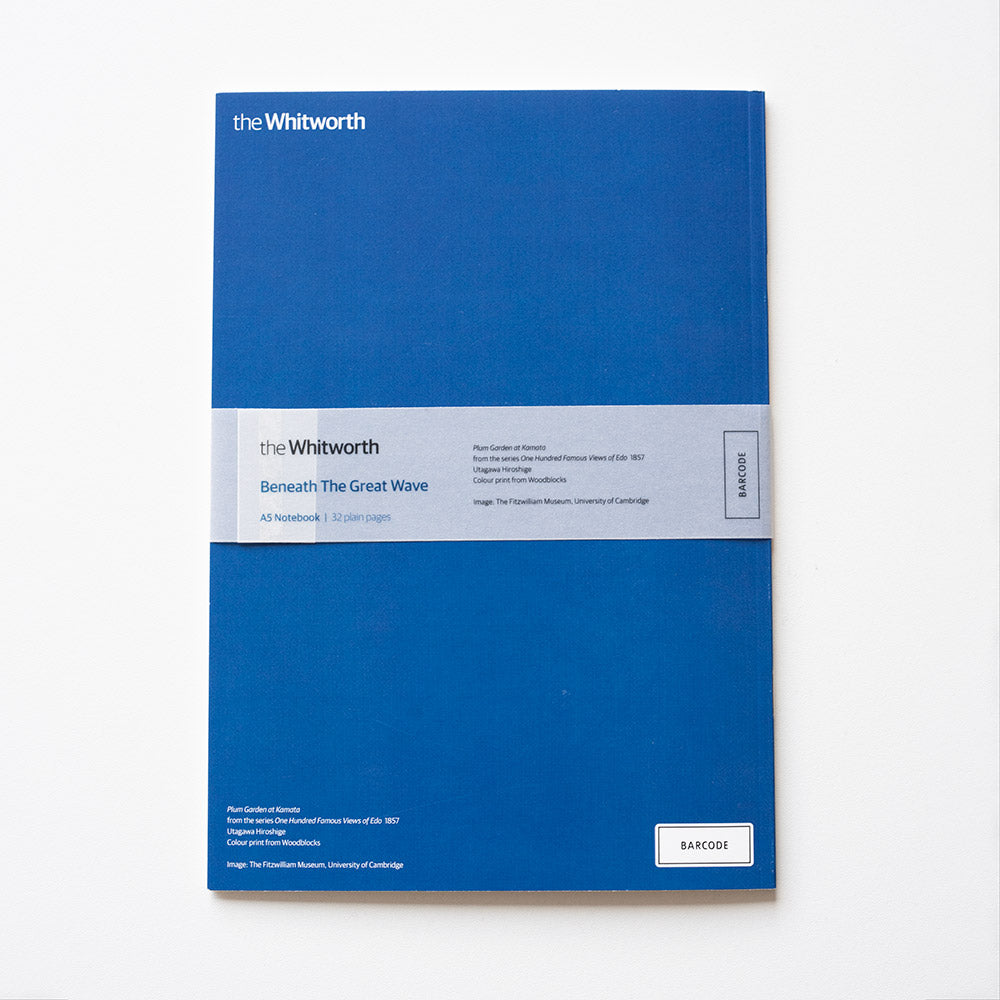 Blue notebook reverse with 'the Whitworth' branding on a white background
