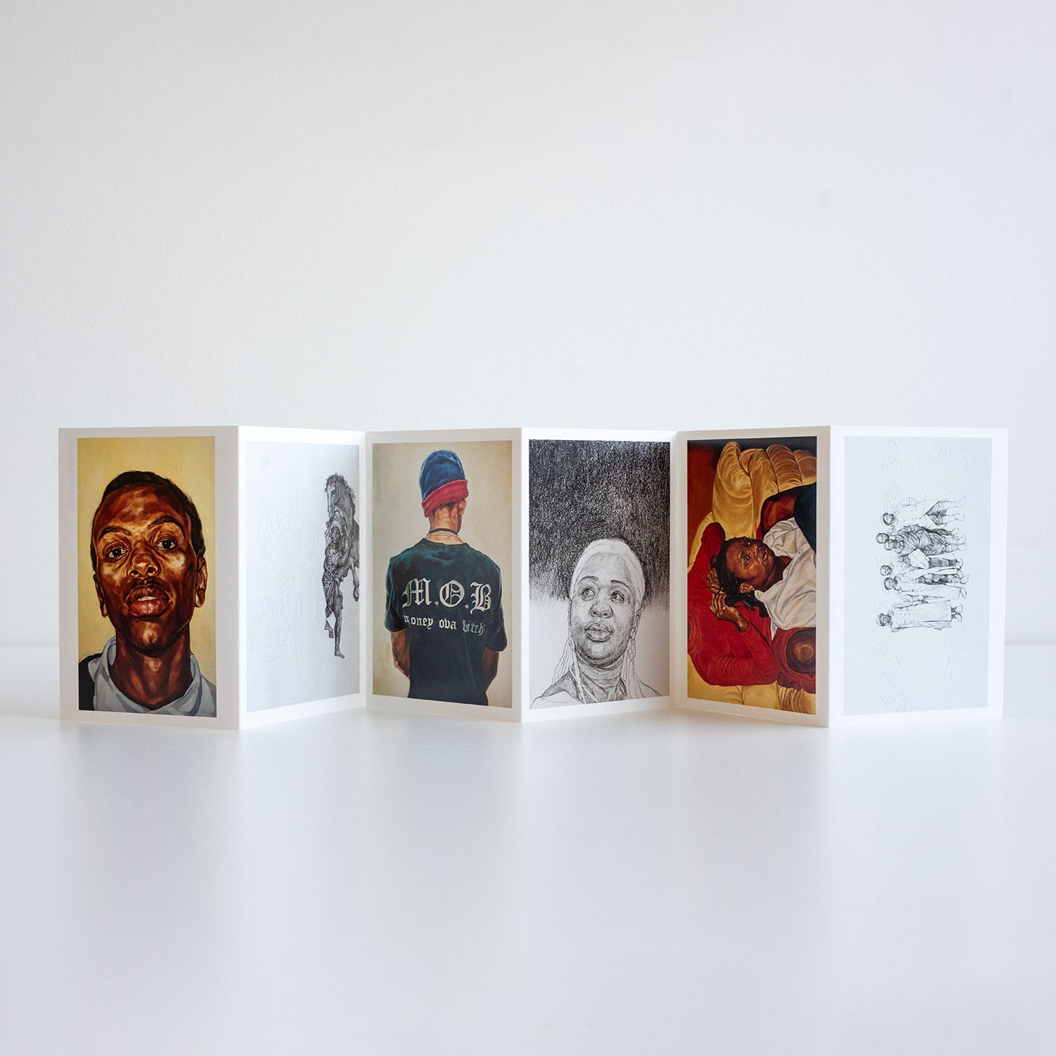 A set of 6 postcards in a concertina format featuring various artworks by Barbara Walker.