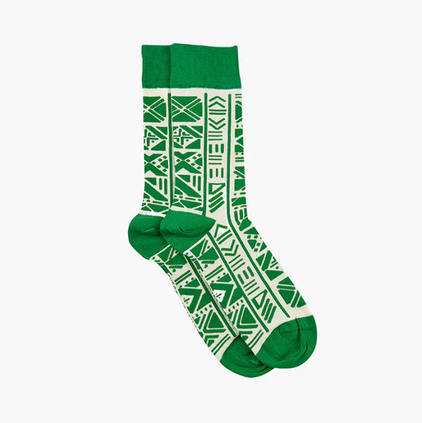 Green patterned socks photographed against a white background.