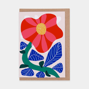 Greetings card featuring a bold colourful illustration of a camelia flower.