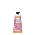A tube of William Morris 'At Morn' hand cream, featuring a red and white damask pattern with a black cap, set against a plain white background.