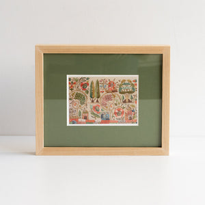 Framed artwork with a colourful design on a green background