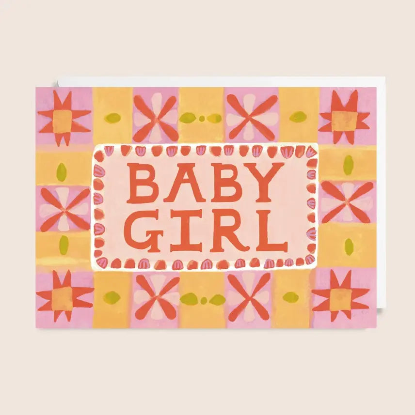 Greeting card with 'Baby Girl' text on a patterned background