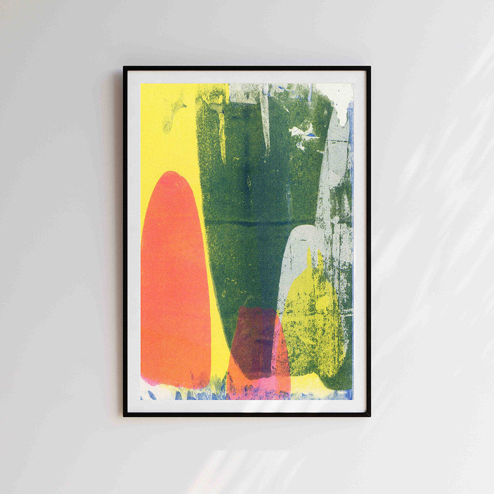 Abstract artwork in yellow, orange and green in a black frame