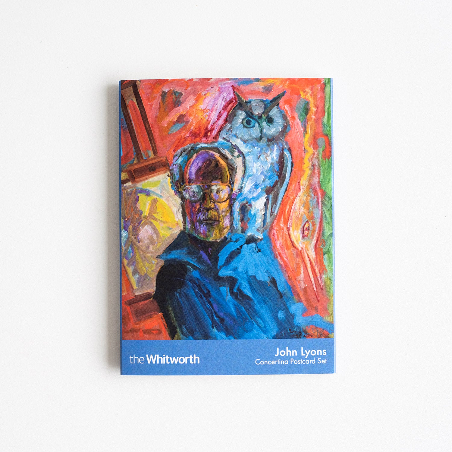 Front cover of concertina postcard pack featuring a self portrait painting by John Lyons