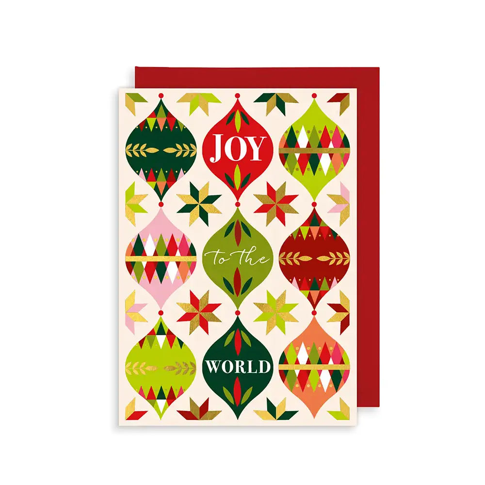 A Christmas card with a pattern of colourful, geometric ornaments. The ornaments are arranged around the text "JOY TO THE WORLD."