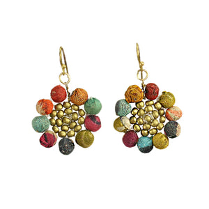 A pair of colourful beaded earrings with gold hoops, shaped like flowers.