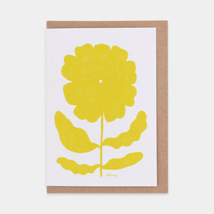 Greetings card featuring yellow flower against white background.