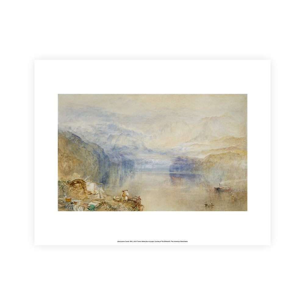 Framed artwork of a landscape with misty mountains and a body of water.