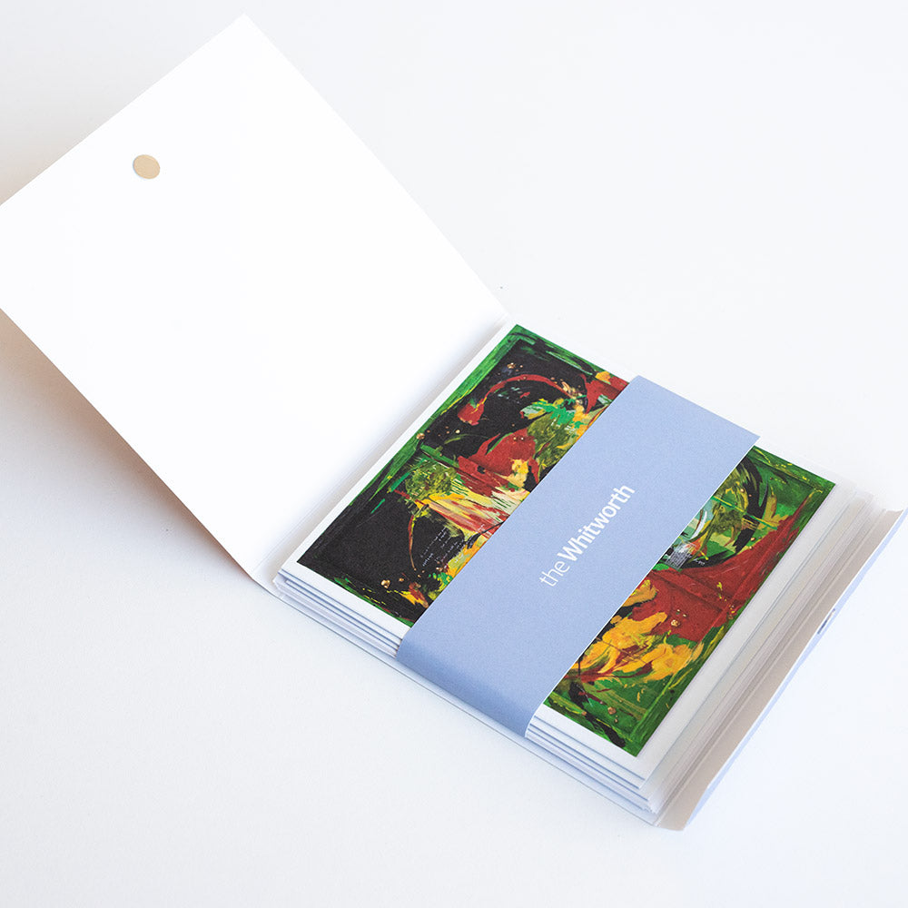 Set of greetings cards open against a white background
