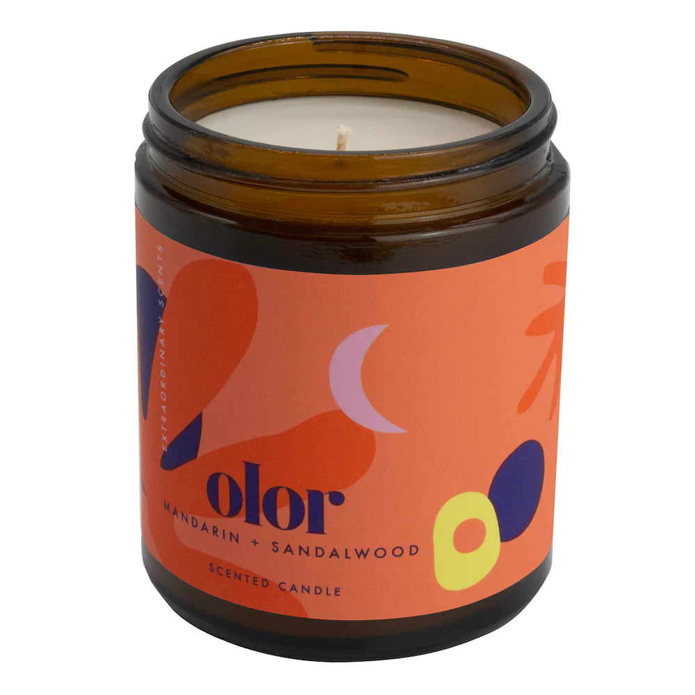 Candle in Jar with Olor orange branding. White background.