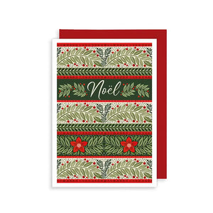 A Christmas card with a festive pattern of green branches, berries, and flowers. The word "NOËL" is written in the centre, surrounded by the pattern.