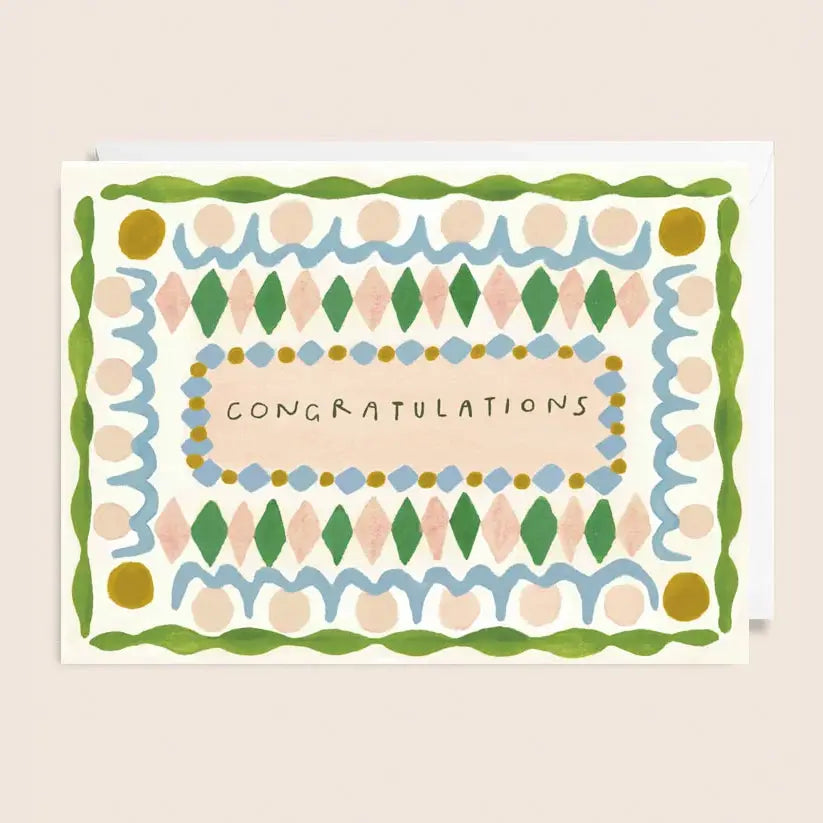 Greetings card with green and pink pattern design and 'congratulations' at the centre