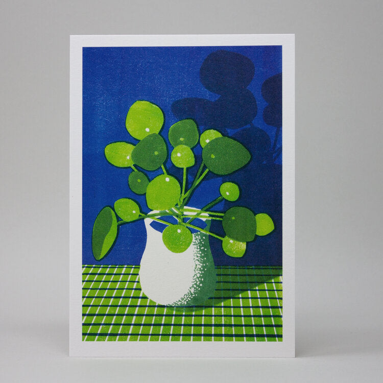 Greetings card featuring an illustration of a Pilea plant in a white vase.