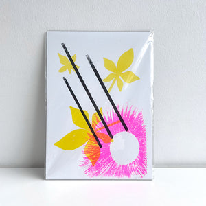 Abstract art print with pink and yellow flowers against a white backdrop