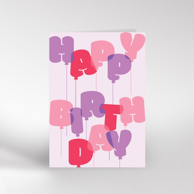 Birthday card with pink and purple balloons in shape of 'Happy Birthday'