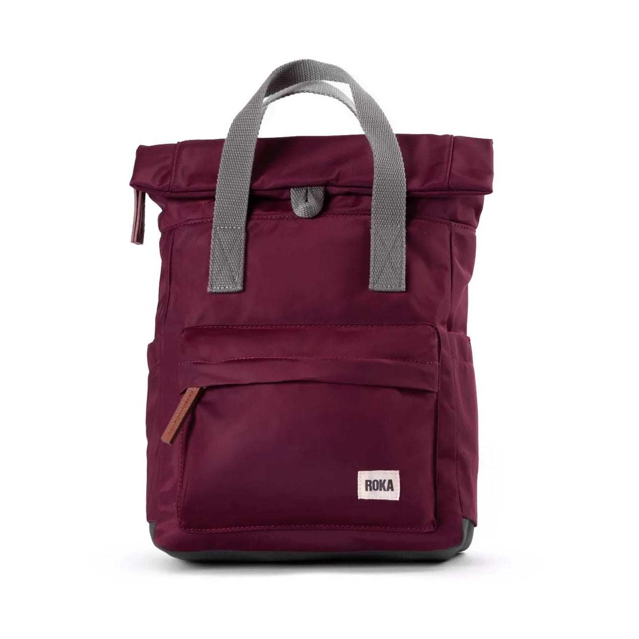 A maroon backpack with gray straps and a roll-top closure. The backpack has a small front pocket and a ROKA logo on the front.