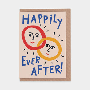 Greetings card with two rings with smiley faces in the middle, and text that reads 'Happily Ever After!'.