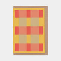 Greetings card featuring an abstract orange, red and grey check design. Brown envelope.