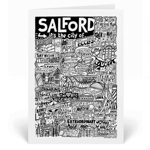 A greetings card with a black and white illustration celebrating Salford's cultural landmarks and music scene, featuring iconic venues, band names, and local references.