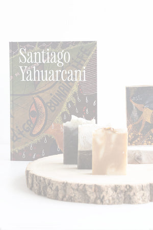 Santiago publication with three soaps presented in front of it